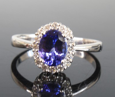 Lot 2248 - An 18ct white gold, tanzanite and diamond oval...
