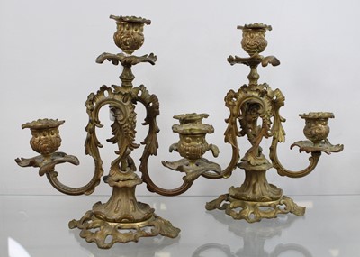 Lot 532 - A pair of gilt metal three sconce table...
