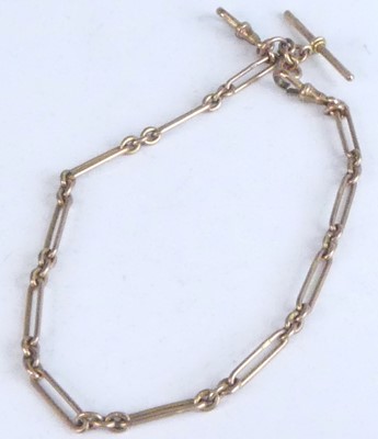 Lot 2289 - A 9ct rose gold fetter and three-link watch...