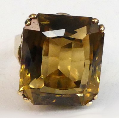 Lot 2505 - A yellow metal citrine dress ring, featuring a...