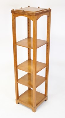 Lot 1117 - An Arts & Crafts walnut four-tier whatnot, of...