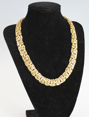 Lot 2273 - An 18ct yellow gold Byzantine link collar,...