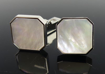 Lot 2286 - A pair of white metal Cartier cufflinks, each...