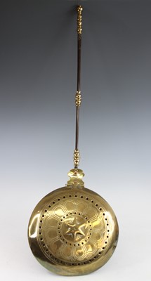 Lot 2342 - A late 17th century brass and iron warming pan,...