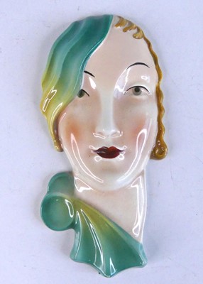Lot 1063 - A small Continental Art Deco pottery stylised...