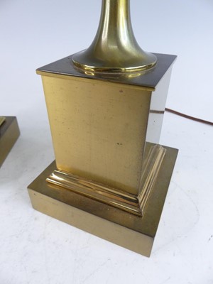 Lot 1221 - Maison Charles - a pair of gilt brass Epis de...