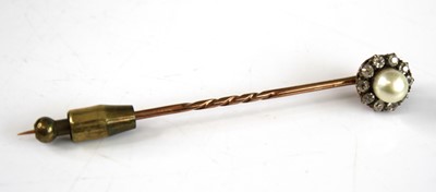 Lot 2226 - A yellow metal, pearl and diamond stick...