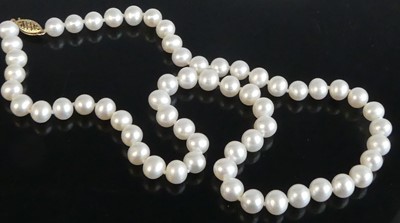 Lot 2532 - A single row of 59 cultured freshwater pearls...