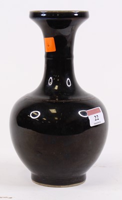 Lot 22 - A Chinese black glazed porcelain vase, six...