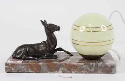 Lot 66 - An Art Deco table lamp, the globular glass...