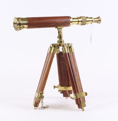 Lot 16 - A brass and hardwood tripod telescope