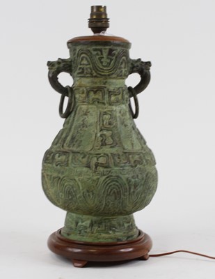 Lot 65 - A Chinese verdigris metal table lamp, of...