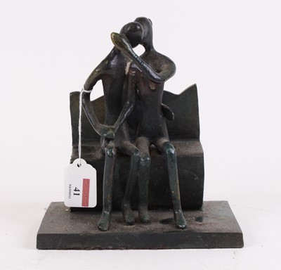 Lot 41 - A bronze figure group, both shown seated,...