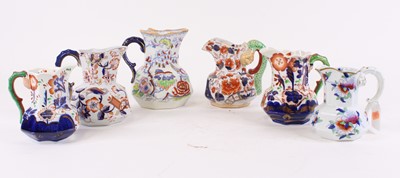 Lot 49 - Six Victorian ironstone jugs, largest height 15cm