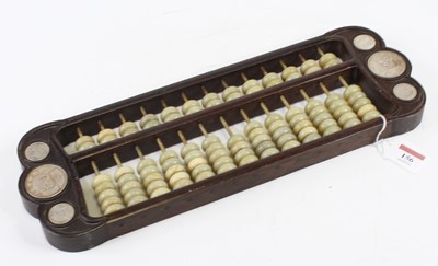 Lot 156 - A Chinese carved hardwood and green polished...