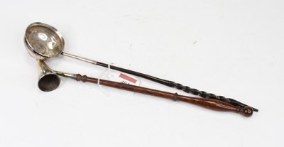 Lot 404 - An 18th century white metal toddy ladle, inset...