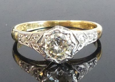 Lot 2539 - A yellow and white metal diamond solitaire...