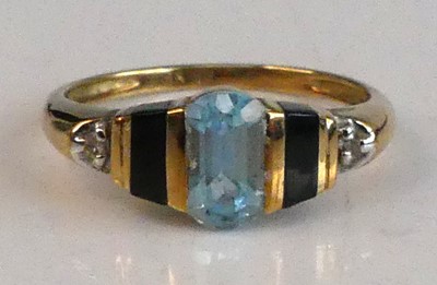 Lot 2540 - A yellow metal, blue topaz and diamond Art...