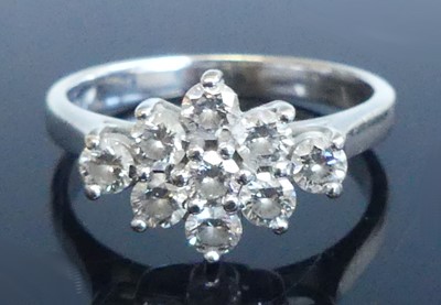 Lot 2563 - An 18ct white gold diamond navette shaped...