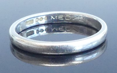 Lot 2565 - A platinum 2.3mm D-shaped wedding band, size L,...
