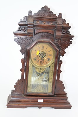 Lot 6 - An early 20th century gingerbread type mantel...
