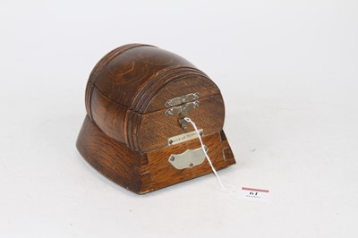 Lot 61 - An early 20th century oak music box in the...