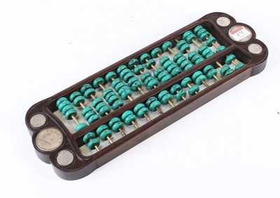 Lot 172 - A Chinese hardwood abacus, inset with coins, w....