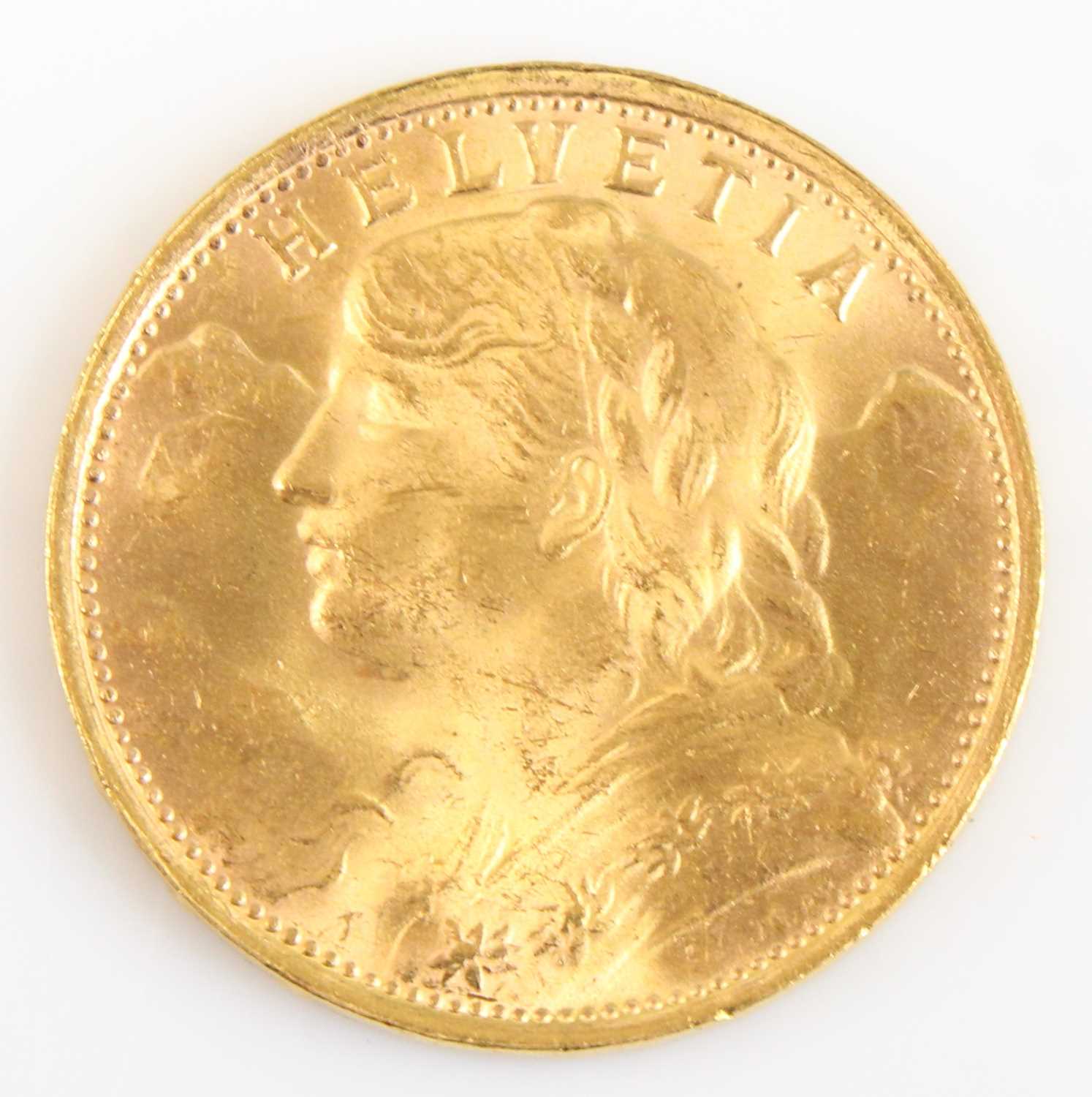 Lot 2046 - Switzerland, 1935 gold 20 francs, obv; female...