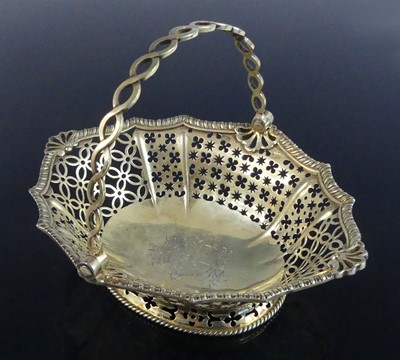 Lot 2071 - A late 18th century silver-gilt swing handle...