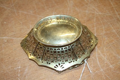 Lot 2071 - A late 18th century silver-gilt swing handle...