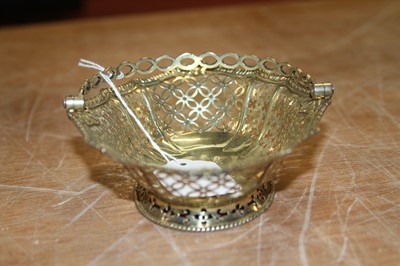 Lot 2071 - A late 18th century silver-gilt swing handle...