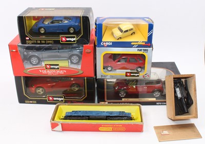 Lot 1512 - A Burago and Maisto collection, 5 models to...