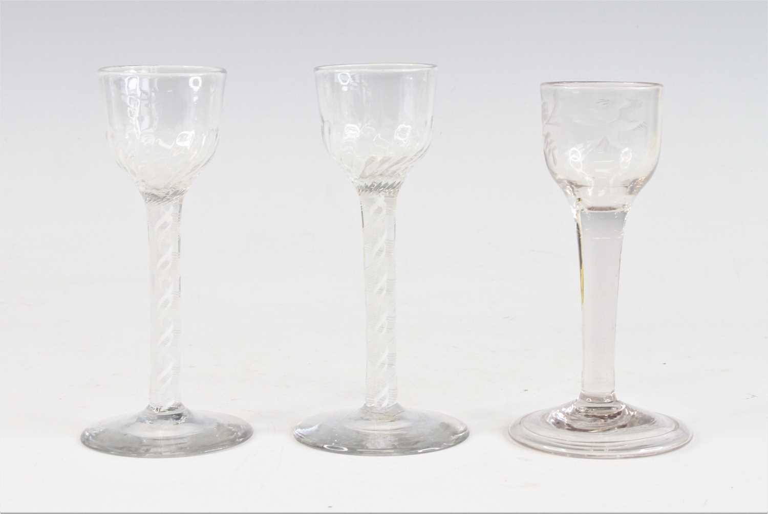 Lot 2051 - A pair of wine glasses, circa 1770, the basal...