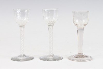Lot 2051 - A pair of wine glasses, circa 1770, the basal...