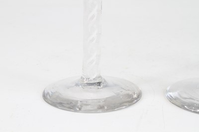 Lot 2051 - A pair of wine glasses, circa 1770, the basal...