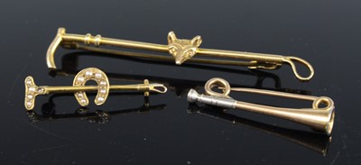 Lot 2615 - A yellow metal brooch fashioned as a hunting...