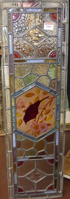 Lot 1003 - A Victorian stained glass lead light, 75 x 22.5cm