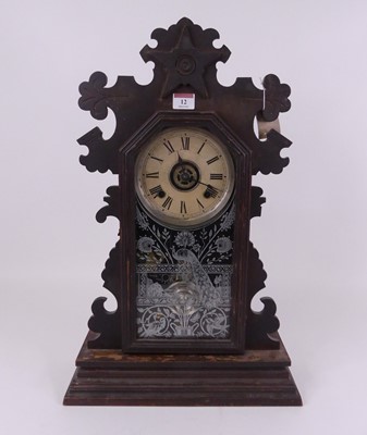 Lot 12 - An early 20th century gingerbread type mantel...