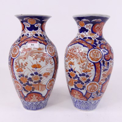 Lot 86 - A pair of Imari porcelain vases, each of...