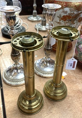 Lot 100 - A pair of early 20th century brass candle...