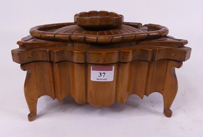 Lot 37 - A continental walnut table top box of shaped...