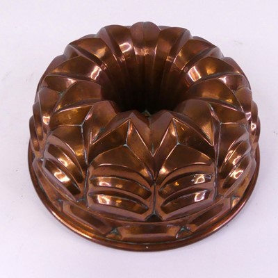 Lot 38 - A continental copper cake mould, dia. 27cm