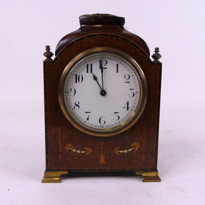Lot 39 - An Edwardian mahogany cased mantel clock, the...