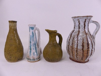 Lot 42 - A 20th century studio pottery jug, having a...