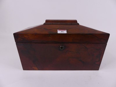 Lot 44 - A Regency rosewood tea caddy of sarcophagus...