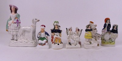 Lot 45 - A Staffordshire pottery figure group, of a...