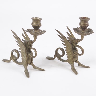 Lot 110 - A pair of cast brass table candlesticks, each...
