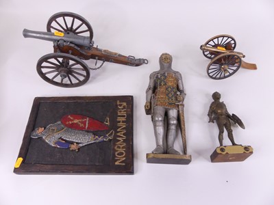 Lot 61 - A cast metal model of a canon on a wooden...