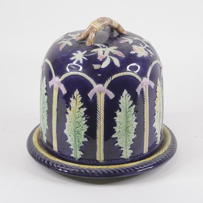 Lot 121 - A Victorian majolica glazed cheese dome on...
