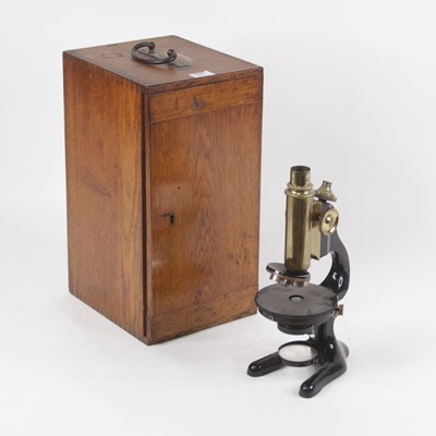 Lot 127 - An early 20th century iron and lacquered brass...